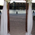 Weddings Ceremonies Arch with drape and fresh flowers