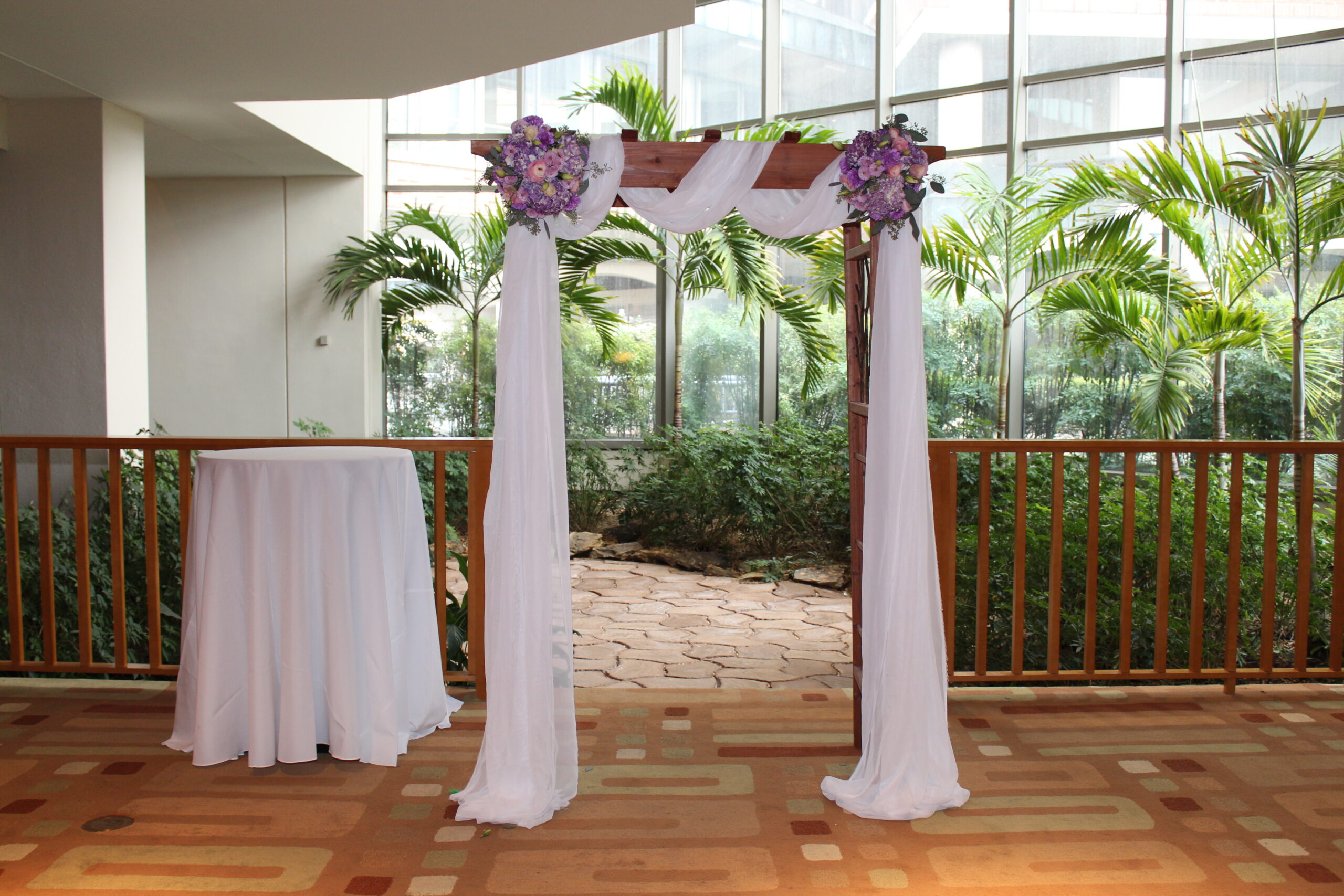 Weddings Ceremonies purple double flowers arch